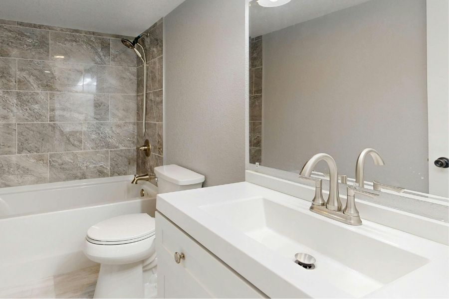 Modern Bathroom with Marble Tile and Vanity